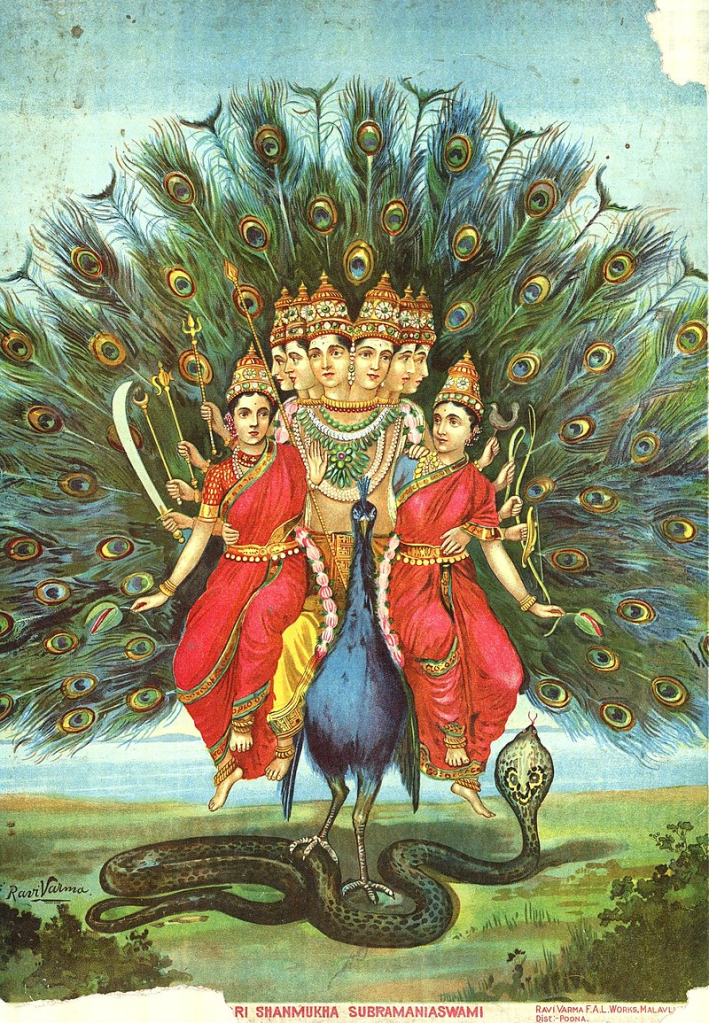 Kartikeya, or Shanmukha Subramanyaswami by Raja Ravi Varma. He is seated on his vehicle- the peacock (mayura) and has twelve hands. He embraces his consort Devasena and Valli. The hands to his left carry a shield, a bow, a noose and a cock. The hands on his right carry a sword, an arrow styled like a crescent, a trident and in the form of boon bestowal (abhaya). Subramanyaswamy’s spear or Vel is seen between his right hand and Maha-Valli. This print from the Ravi Varma Press probably follows the description of Shanmukha as found in the Matsya-purana