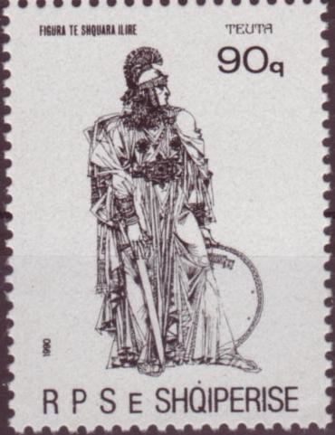 QUEEN TEUTA (Greek: Τεύτα, Albanian: Mbretnesha Teutë or Teuta; ruled 230–228 BC. was a Celto-Illyrian queen of the Ardiaean Kingdom who ruled as regent to the young Pinnes. Teuta inherited a strong Illyrian state from her husband, Agron. Under her rule, Illyrian power continued to grow until Roman intervention (First Illyrian War). By Post of Albania - https://colnect.com/en/stamps/stamp/157046-Teuta_3rd_cent_BC_Queen_regent_of_the_Ardiaei_tribe-Illyrian_Heroes-Albania, Public Domain